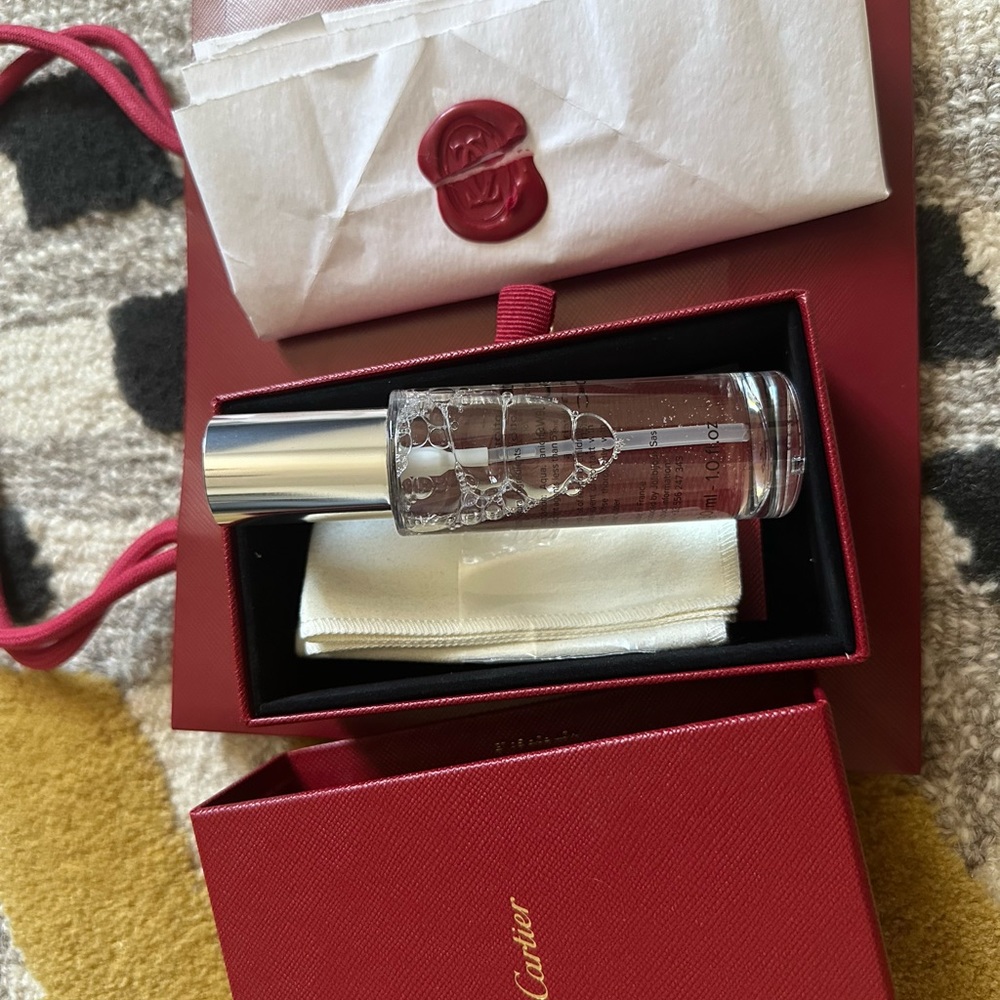 Cartier Silver and Red Perfume Bottle
